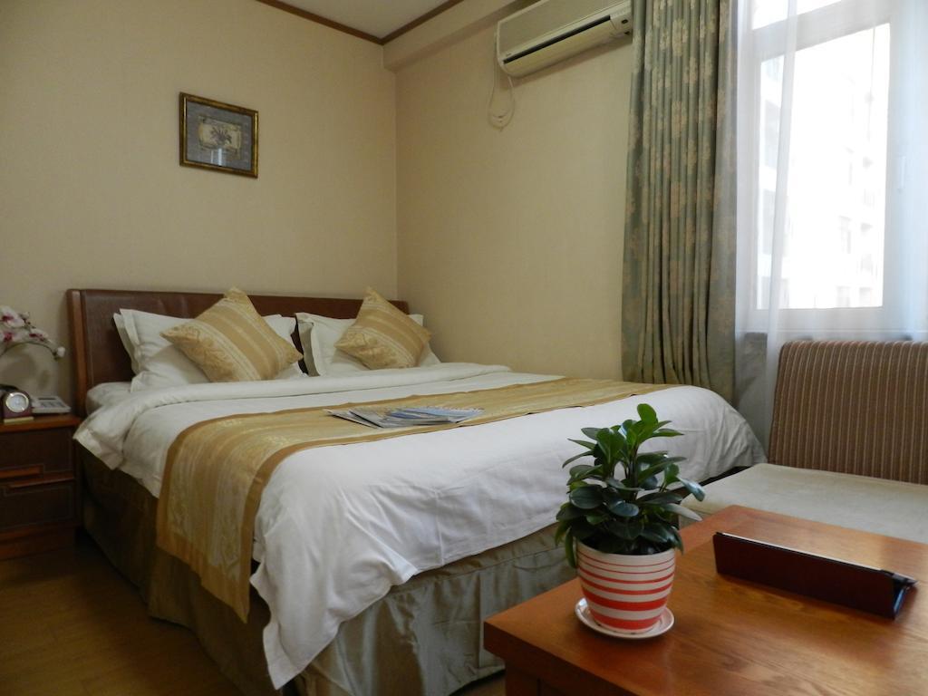 Citadines Gugeng Dalian Aparthotel Room photo